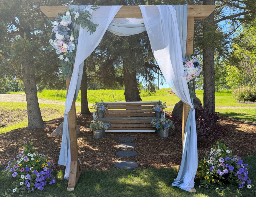 Amy and Kolby's wedding — ceremony on a family acreage, reception at the Bowden Community Hall, Alberta — planned by JK Weddings & Events